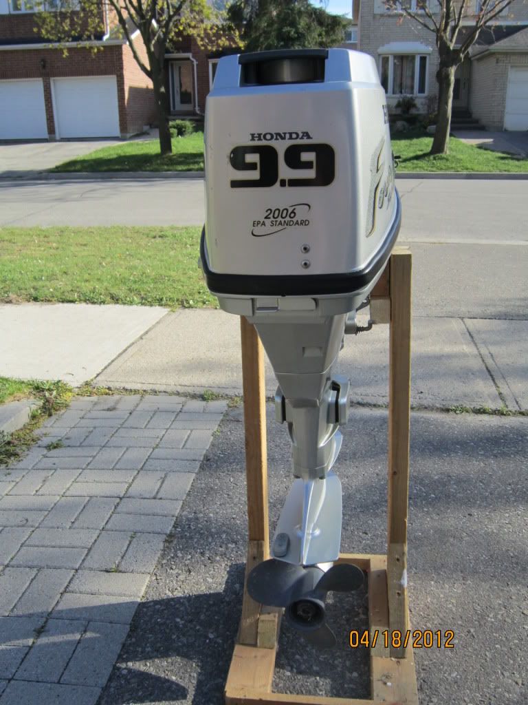 SOLD!!!!!! HONDA 9.9 hp 4 stroke outboard motor w/ remote control