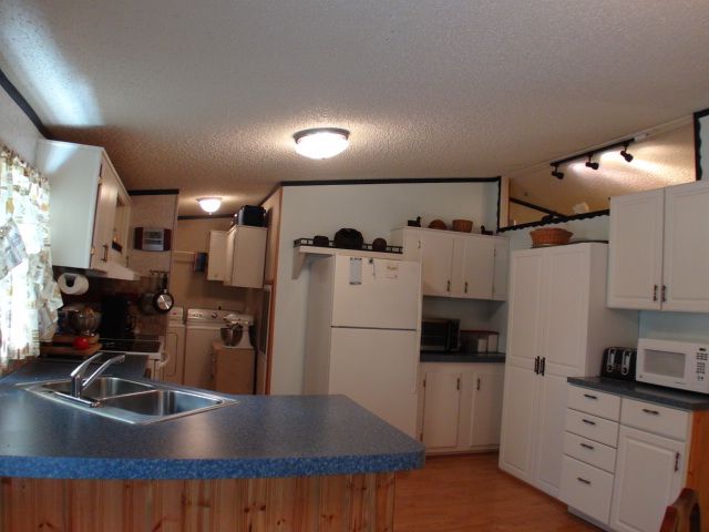 Spacious country kitchen with new cabinets, John Becker Bald Head, Keller Williams Realty Franklin NC