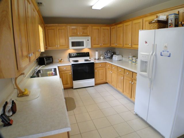 There is lots of counterspace in this large and cheerful kitchen of this mountain home, Family Home for Sale in Franklin NC, Bald Head Realty