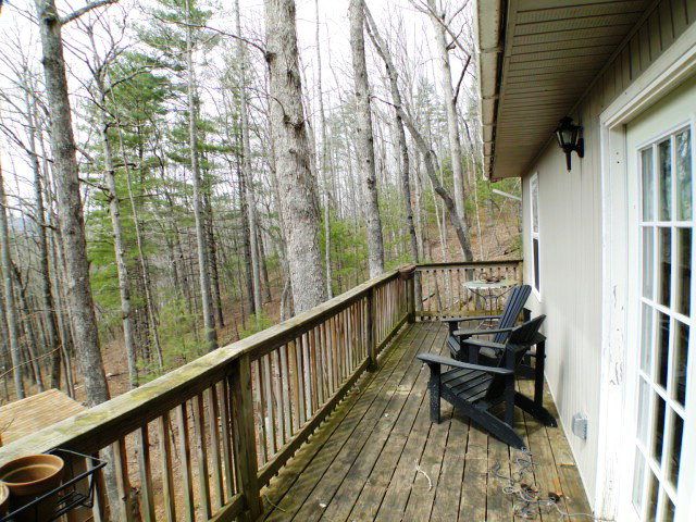 There is a sweet mountain view from the deck in the winter, Low-Maintenance Home in Franklin NC