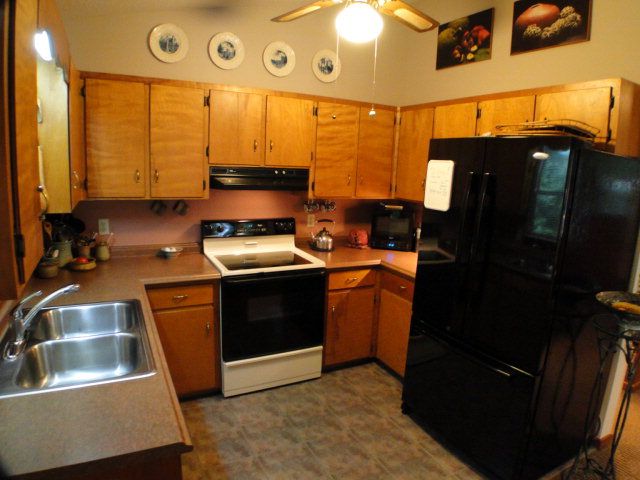 The nice kitchen is open to the dining room, Homes for Sale in Cowee Area of Franklin NC