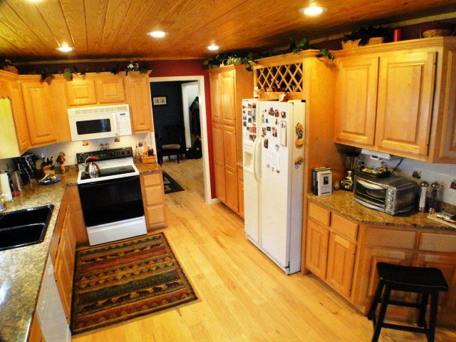 The home has a gigantic kitchen and pantry with a lovely formal dining room plus eat-in-nook, Franklin NC Family Home for Sale