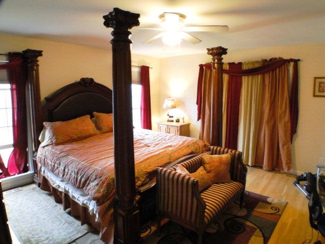 Beautiful master bedroom suite with double-door access to the deck and a gigantic bathroom with big JETTED GARDEN TUB, Real Estate in Franklin NC