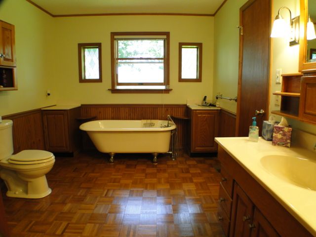 This home boasts a vintage clawfoot tub in the master bedroom suite, Franklin NC Hobby Farm for Sale