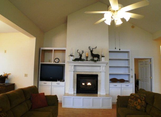 Soaring vaulted ceiling and nice builtins around the gas log fireplace in the main living area, Cartoogechaye Homes for Sale, Homes with Gourmet Kitchen in Franklin NC