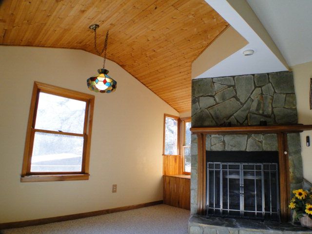 Big living room with rocked gas log fireplace, Franklin NC Family Home for Sale, Bald Head Realty Franklin NC, Pool Homes for Sale in Franklin NC