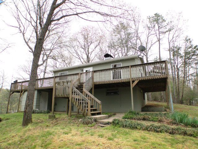 This is truly an awesome property with LOTS of decking to enjoy the views of Lake Emory, Franklin NC Lake View Home for Sale