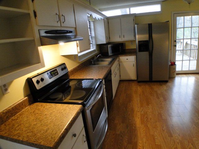 Big country kitchen with lots of light and new flooring, Lake Home for Sale in Franklin NC, Free MLS Search Macon County