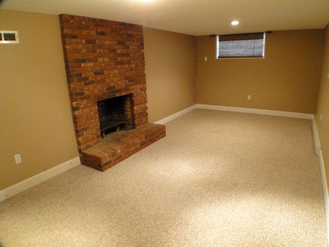Welcome to the family room with wood-burning fireplace, 2 Story Home for Sale in Franklin NC
