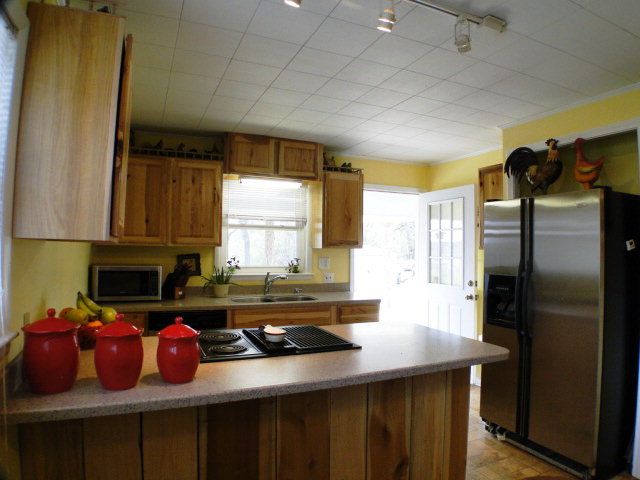 There is a NEW kitchen with Corian countertops and stainless steel appliances, Franklin NC Homes for Sale under 100k, Family Home for Sale in Franklin