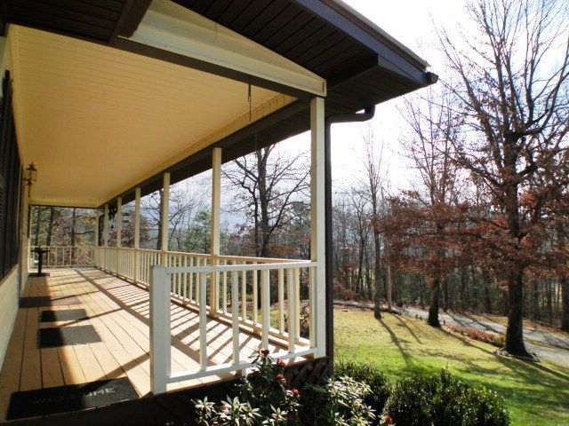 A gorgeous yard and a nice front deck to enjoy the view, Franklin NC Homes for Sale
