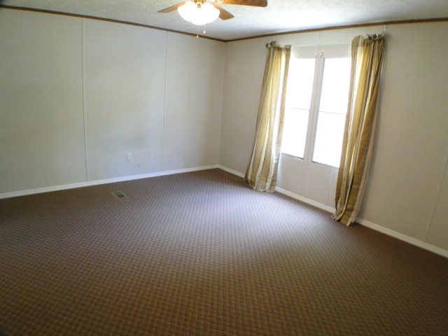 There's a huge master bedroom and 2 other nice-sized bedrooms, Mobile Homes for Sale in Franklin NC