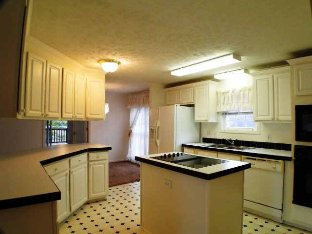 The home has a wonderful COUNTRY KITCHEN with lots of cabinets and open to the living and dining rooms, Franklin NC Retirement, Franklin NC 55+ Properties