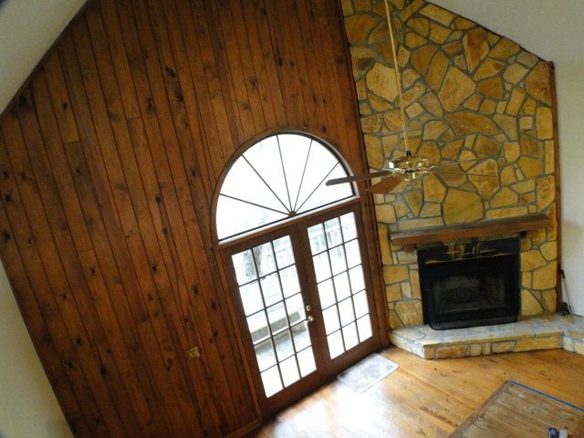 A soaring stone fireplace highlights this great mountain cabin in Otto NC, Bald Head Realty Otto NC, Real Estate in Otto NC