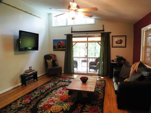 The living room of this home at 514 Trimont Mountain Road in Franklin is cozy and cheerful!