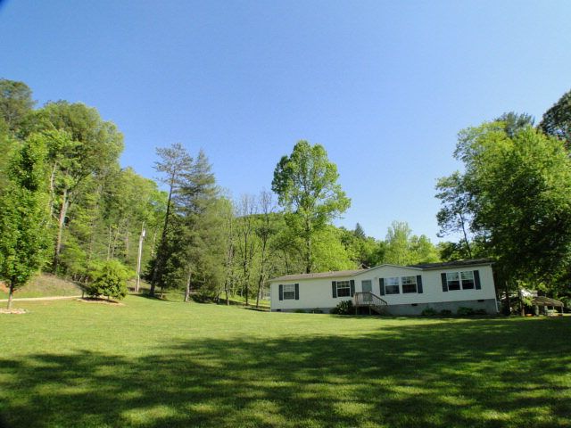 This home has a large one acre flat yard perfect for the kid or grandkids, John Becker Bald Head Franklin NC Real Estate