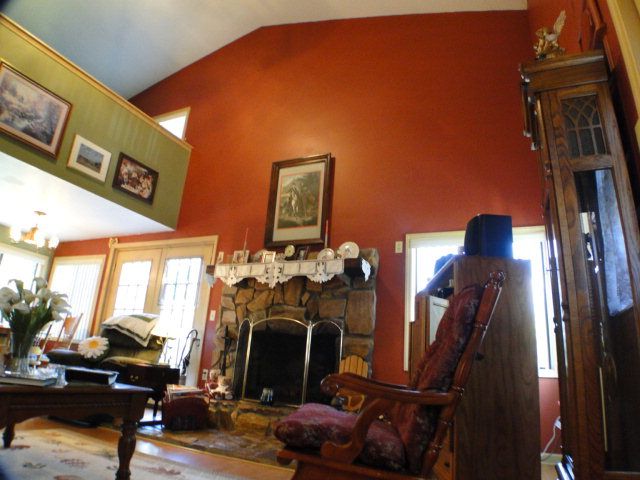 A lovely living room with vaulted ceilings and gas-log fireplace, Home for Sale in Franklin NC