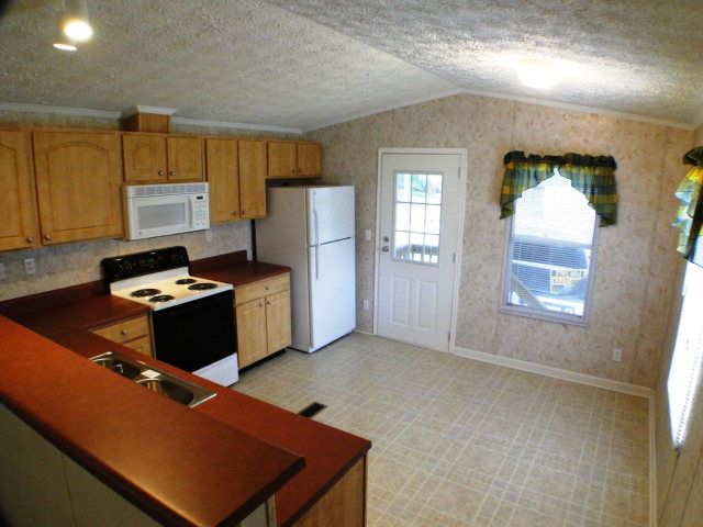 This singlewide mobile home has a super nice eat-in kitchen, Rolling Acres Franklin NC