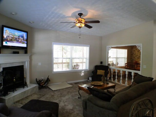The home has large rooms, big windows, wood-burning fireplace and a cozy feel, Bald Head the Realtor, John Becker