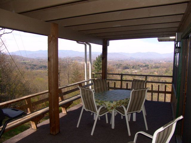 Sit on the covered deck and enjoy that mountain view overlooking Franklin NC, Chalet for Sale in Western NC