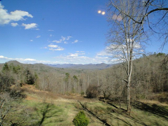 This property has amazing long-range mountain views and is private but not remote, Custom Log Home for Sale with Acreage in NC, Western NC Mountain Homes for Sale
