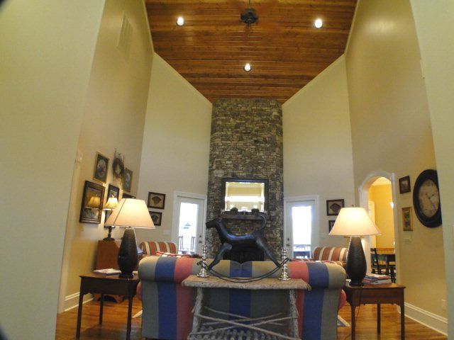 Beautiful rock fireplace and soaring wood ceiling in this mountain home, 88 Willowbrook Estates Road Franklin NC