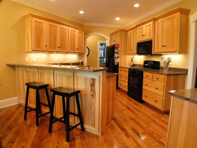 A dream kitchen with upgraded appliances and hardwood floors, Bald Head Realty Franklin NC, John Becker Homes for Sale