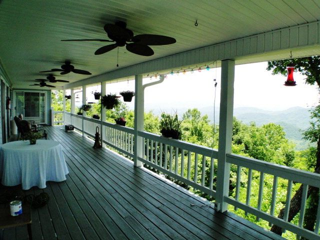 This home has 2 huge covered decks that both have ceiling fans to keep you cool.